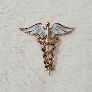 Brooch - universal medical symbol